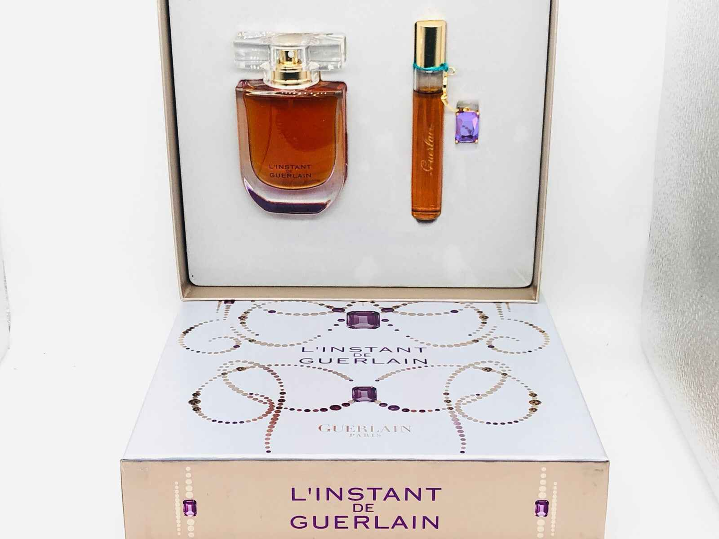 Set regalo con profumo Guerlain L'Instant in flacone elegante e mini formato per viaggi
