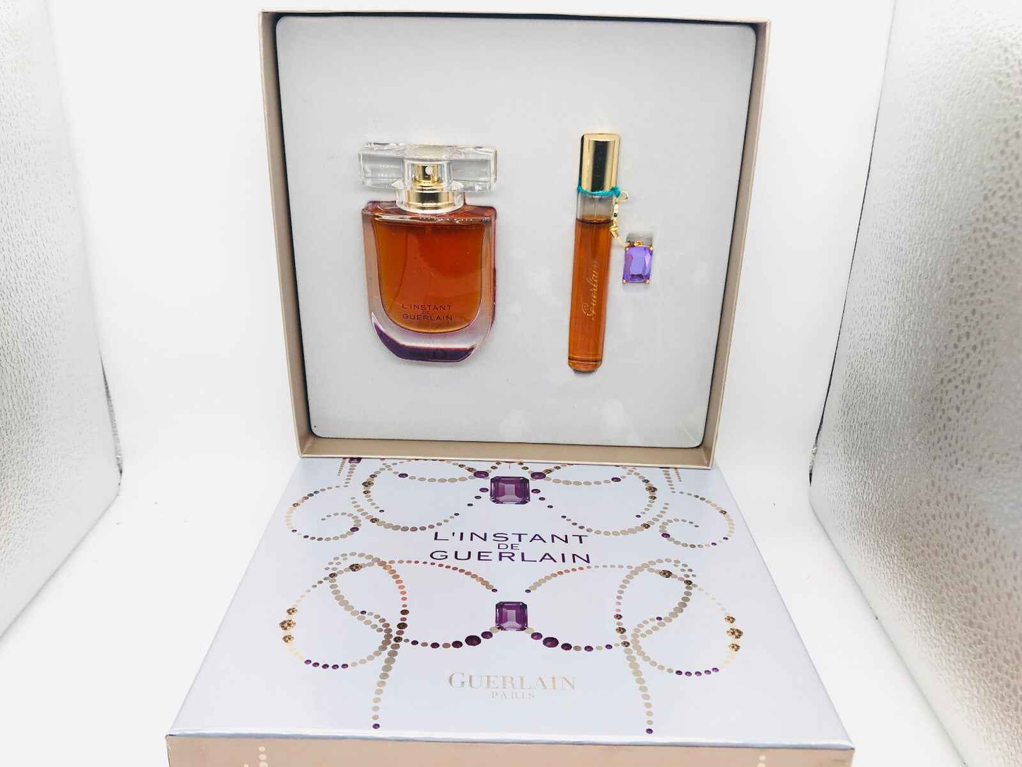 Set regalo profumo Guerlain L'Instant con flacone e miniatura elegante per un'esperienza sensoriale unica