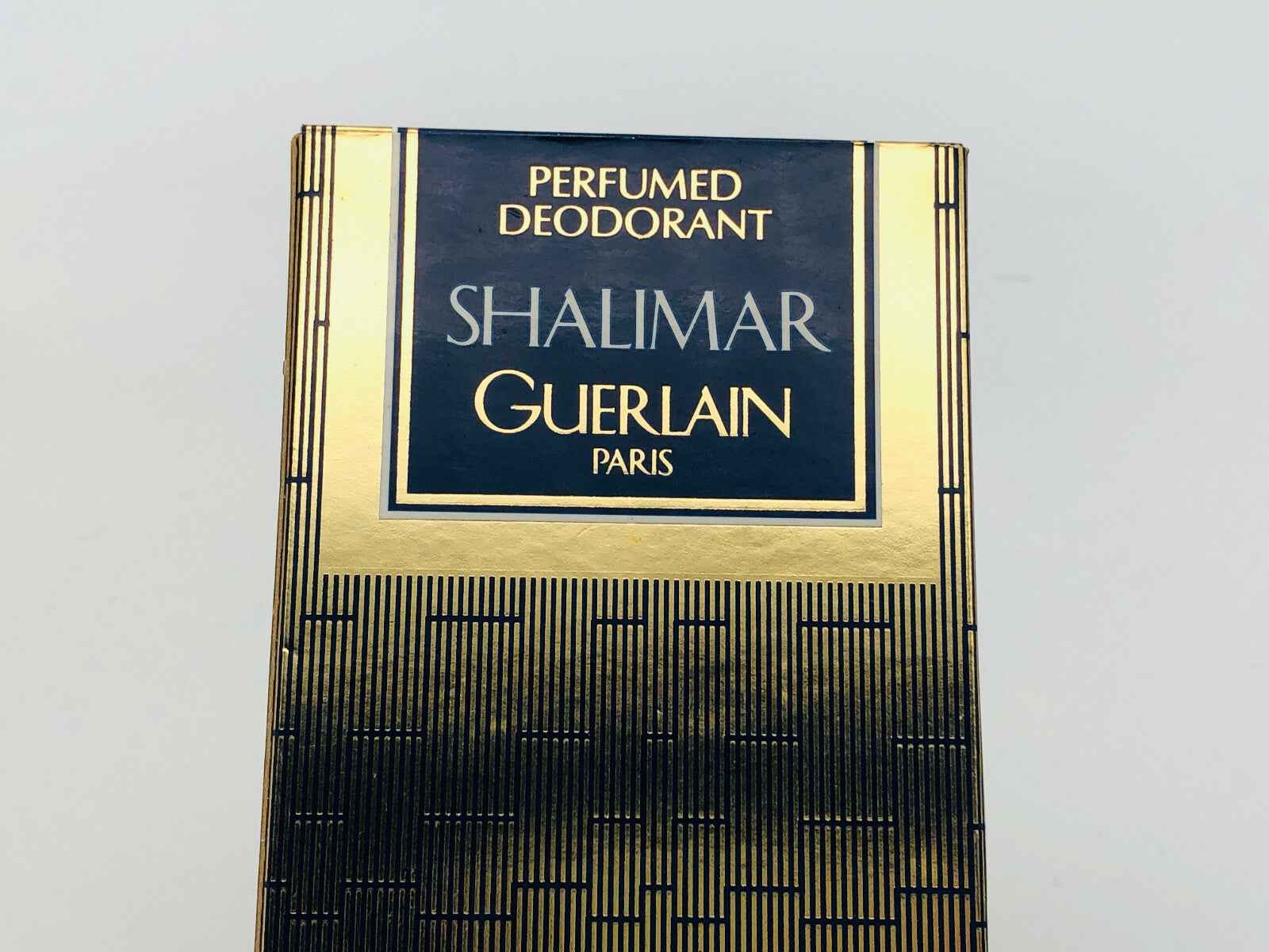 Deodorante profumato Guerlain Shalimar Vintage con elegante packaging dorato e blu