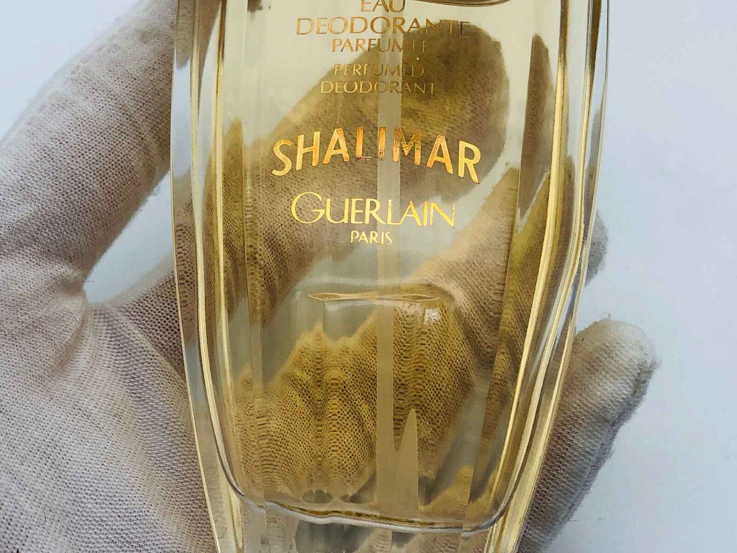 Deodorante Profumato Guerlain Shalimar Vintage in bottiglia elegante con etichetta dorata