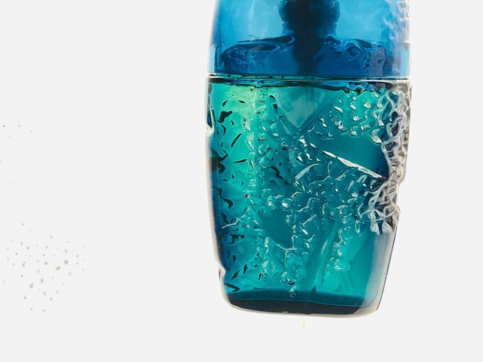 Flacone di profumo Horizon Guy Laroche con design blu e verde, perfetto per uomini eleganti