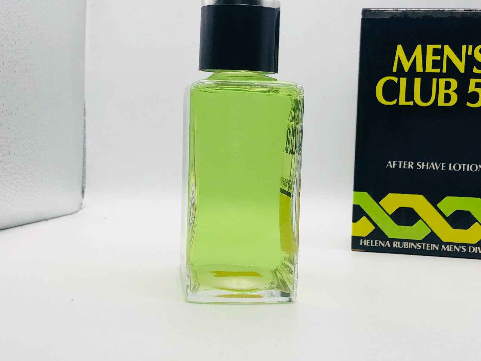 Lozione dopobarba Helena Rubinstein Men's Club 52 in flacone trasparente con etichetta vivace