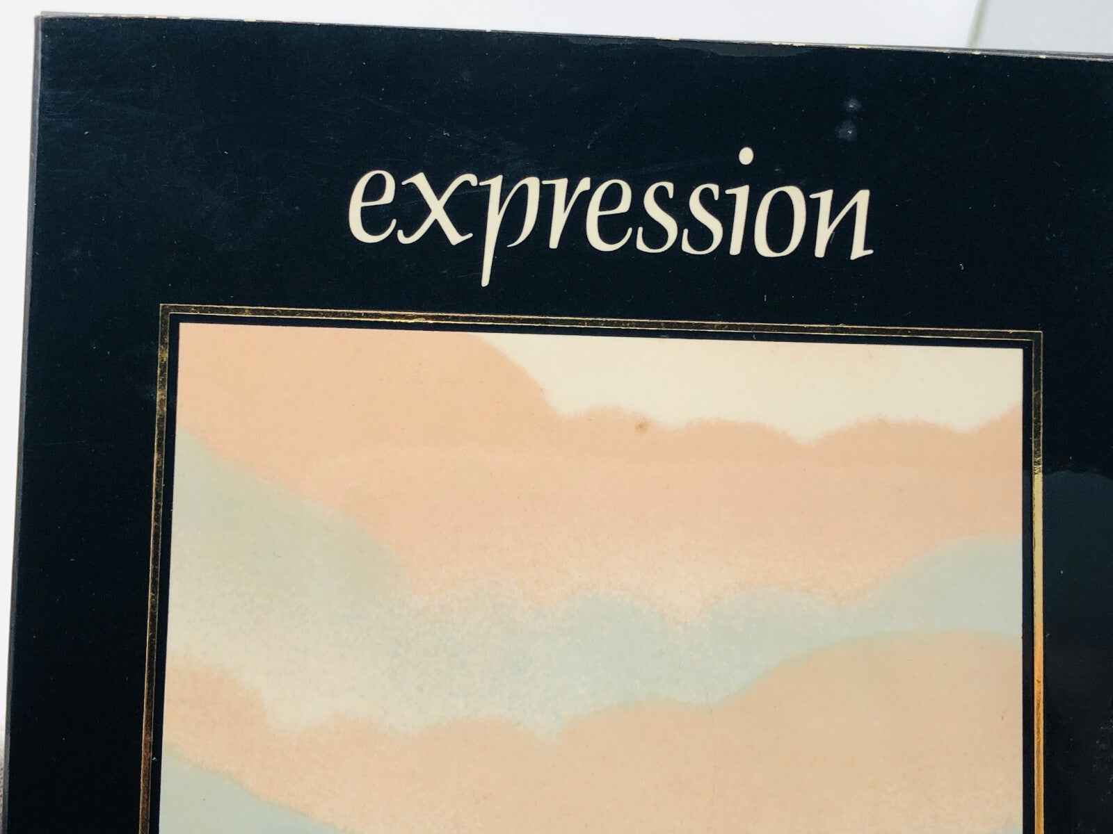 Fath Expression Vintage, confezione elegante con design astratto dai toni caldi