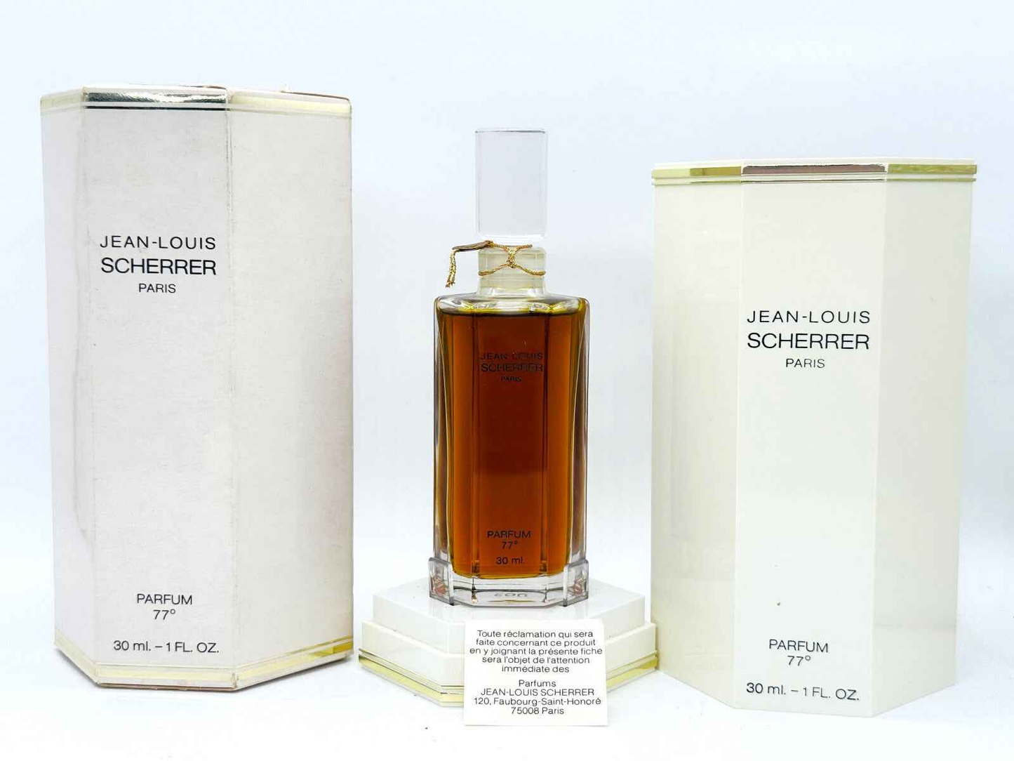Jean Louis Scherrer 1 Parfum Extrait in elegant bottle with box, perfect for luxury fragrance lovers