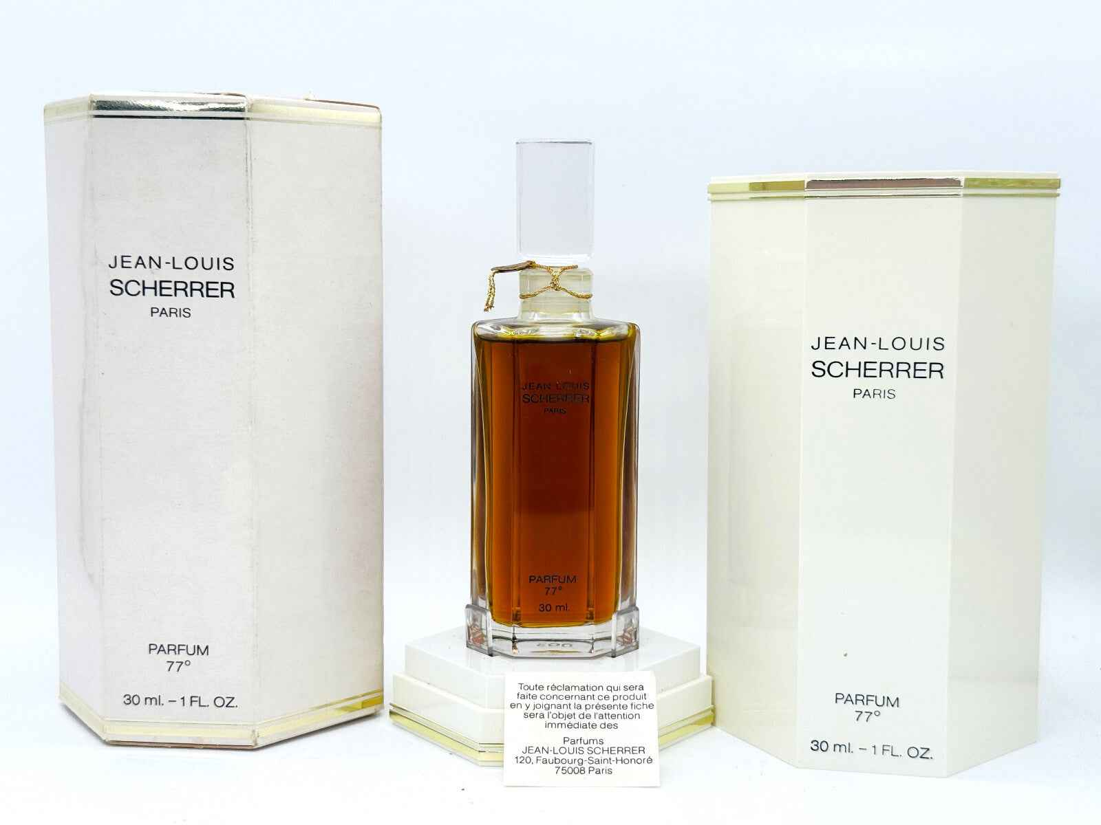 Jean Louis Scherrer 1 Parfum Extrait in elegant bottle with box, perfect for luxury fragrance lovers