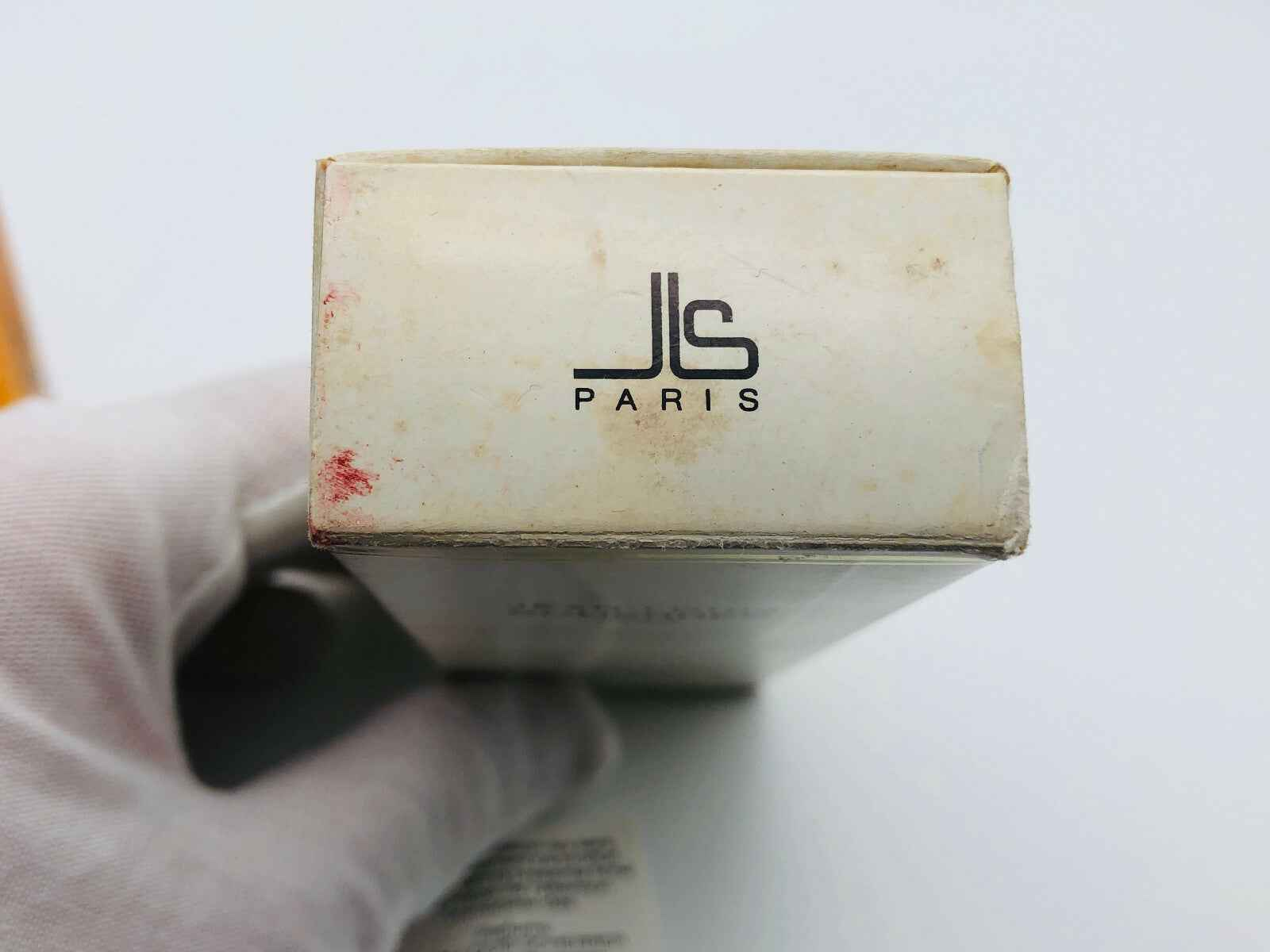 Scatola di profumo Jean Louis Scherrer con logo JLS a PARIGI e design elegante