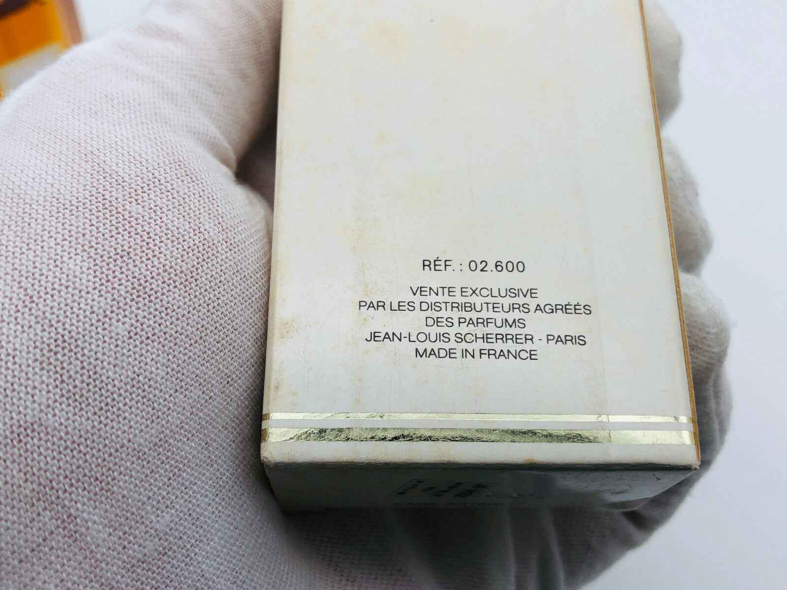 Scatola del profumo Jean Louis Scherrer con dettagli informativi e di produzione in francese