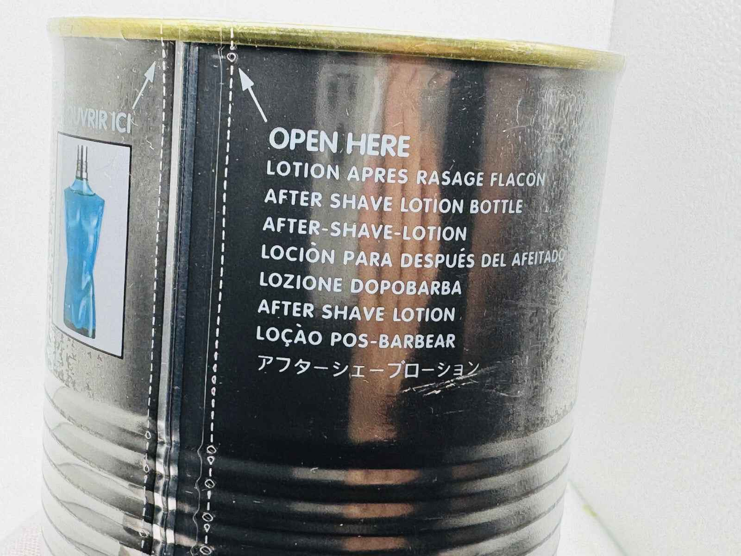 Flacone di lozione dopobarba Jean Paul Gaultier Le Male Vintage con istruzioni d'uso chiare
