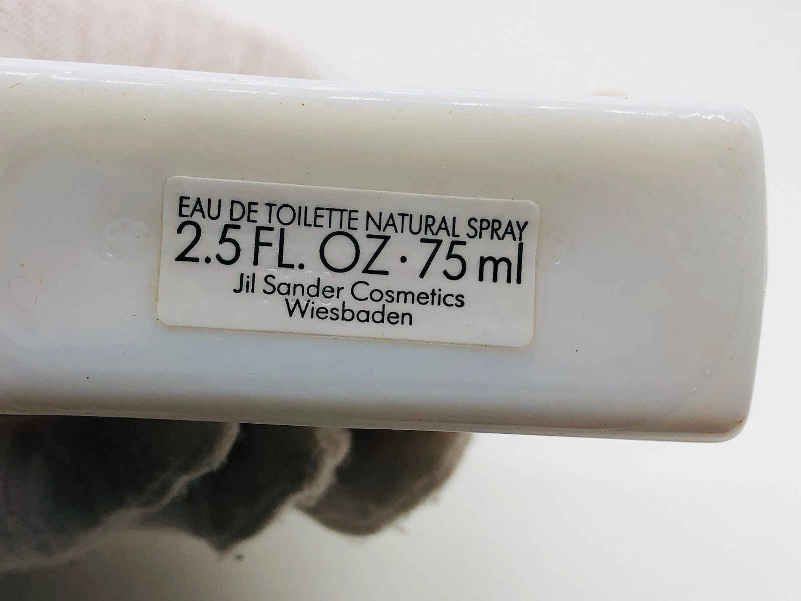 Flacone di Eau de Toilette Jil Sander Bath And Beauty da 75 ml con etichetta chiara