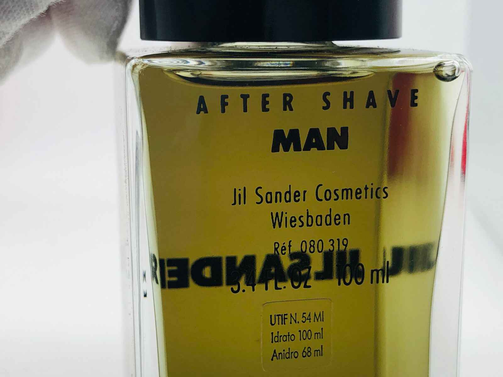 Profumo dopobarba Jil Sander Feeling Man in flacone elegante da 100 ml per la cura maschile