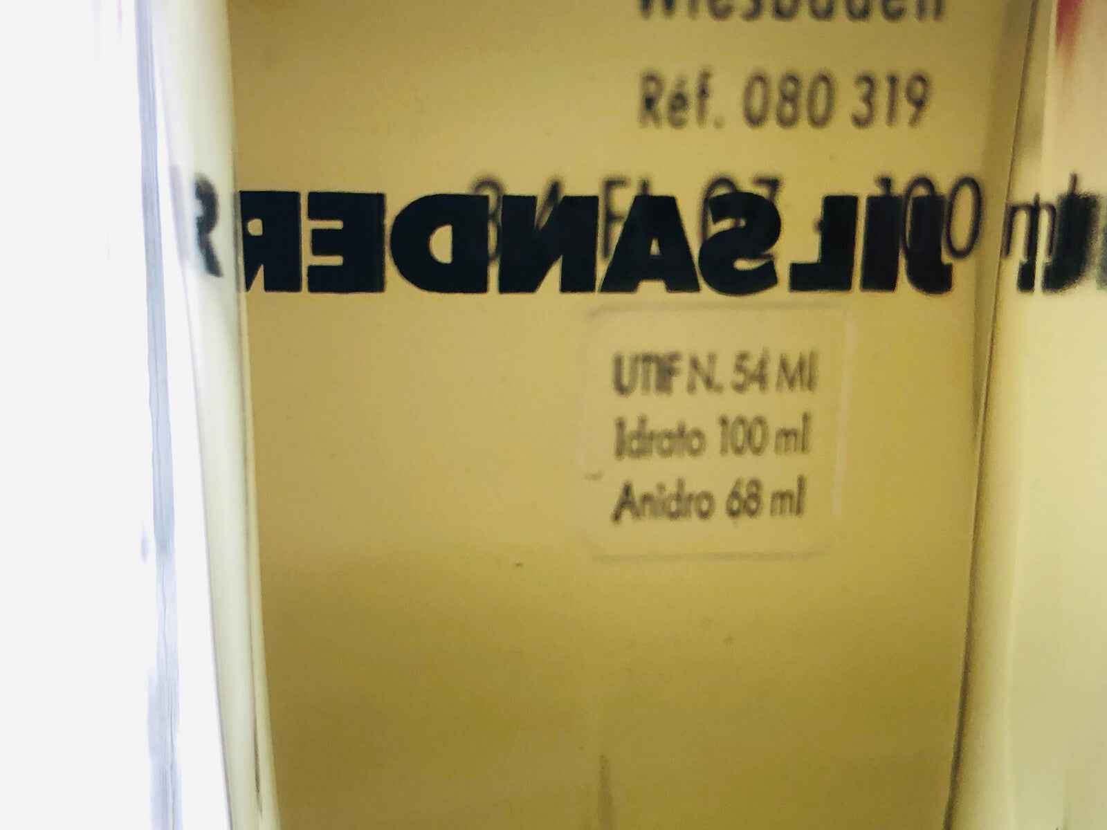 Profumo Jil Sander Feeling Man in flacone da 54 ml, elegante e fresco per l'uomo moderno