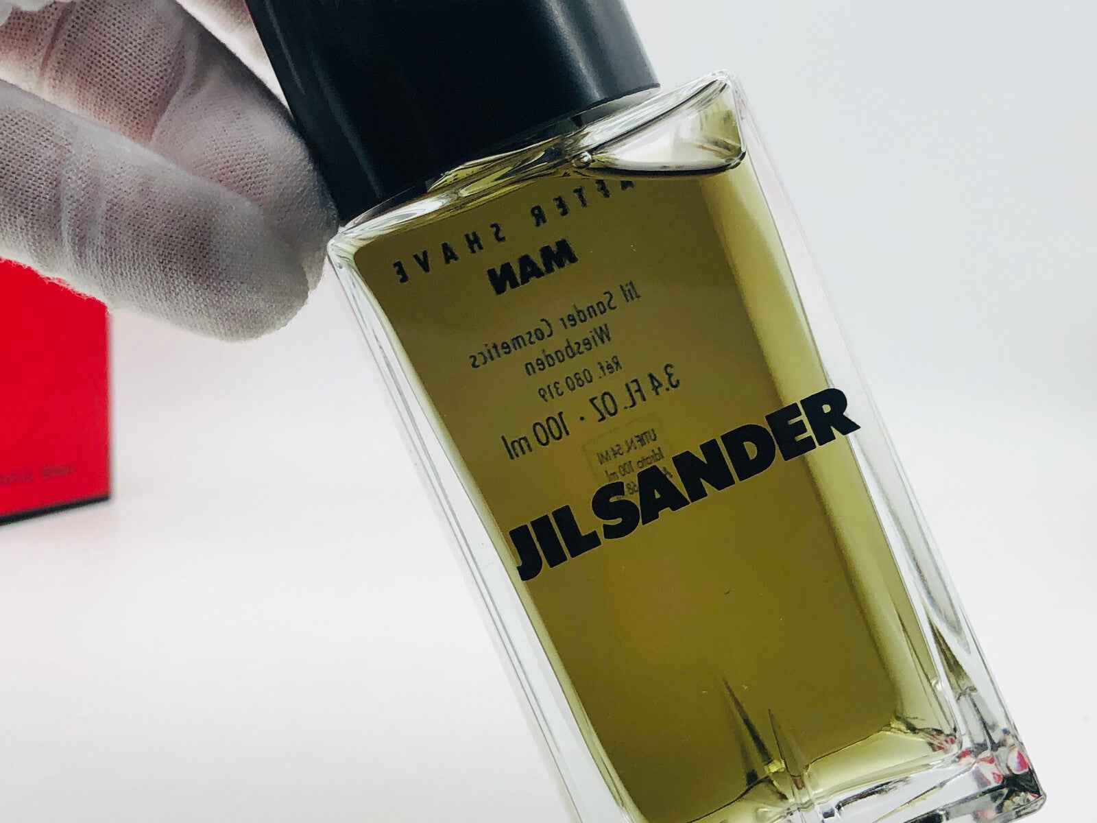 Profumo Jil Sander Feeling Man in bottiglia elegante da 100 ml con tappo nero