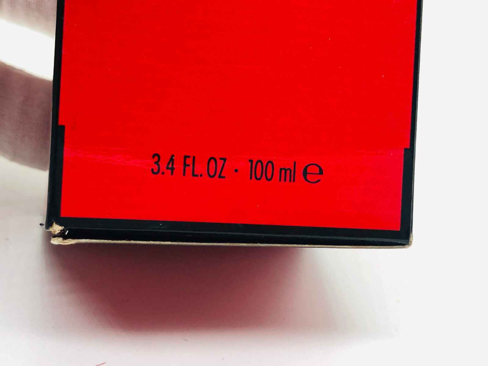 Confezione di profumo Jil Sander Feeling Man da 100 ml con design elegante e moderno