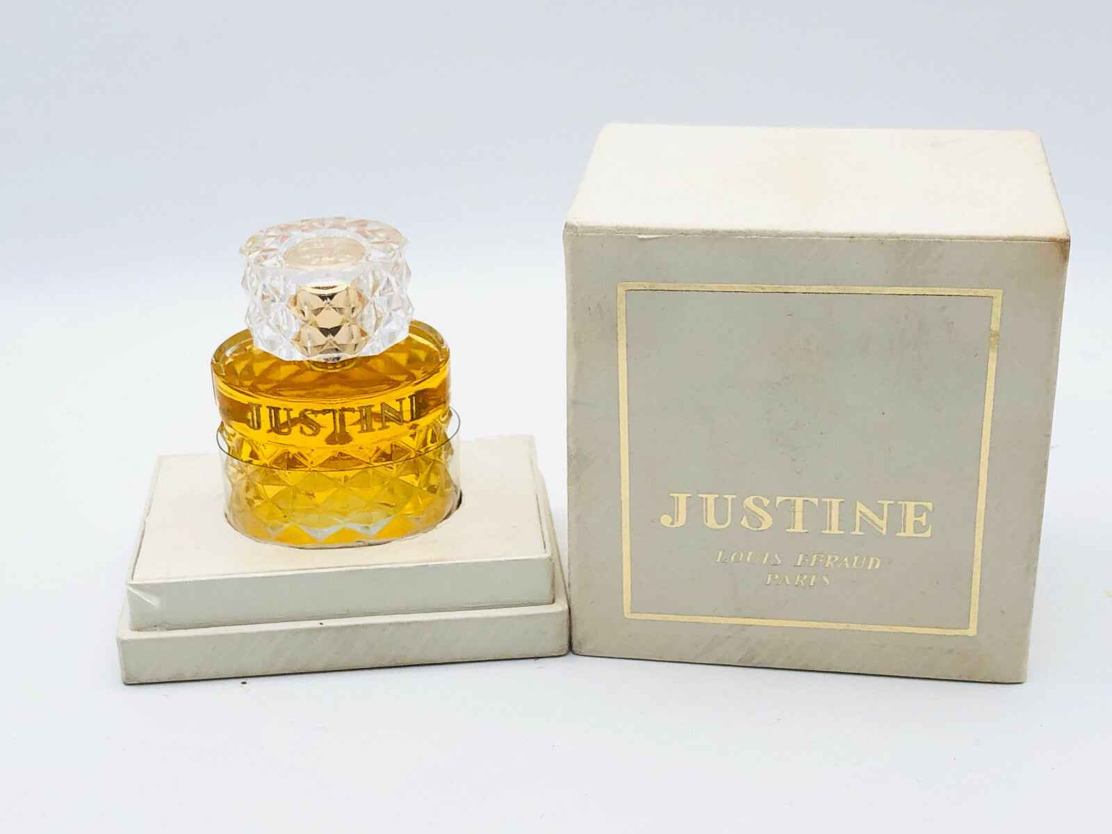 Profumo Justine Louis Feraud in bottiglia vintage con scatola originale ed etichetta elegante