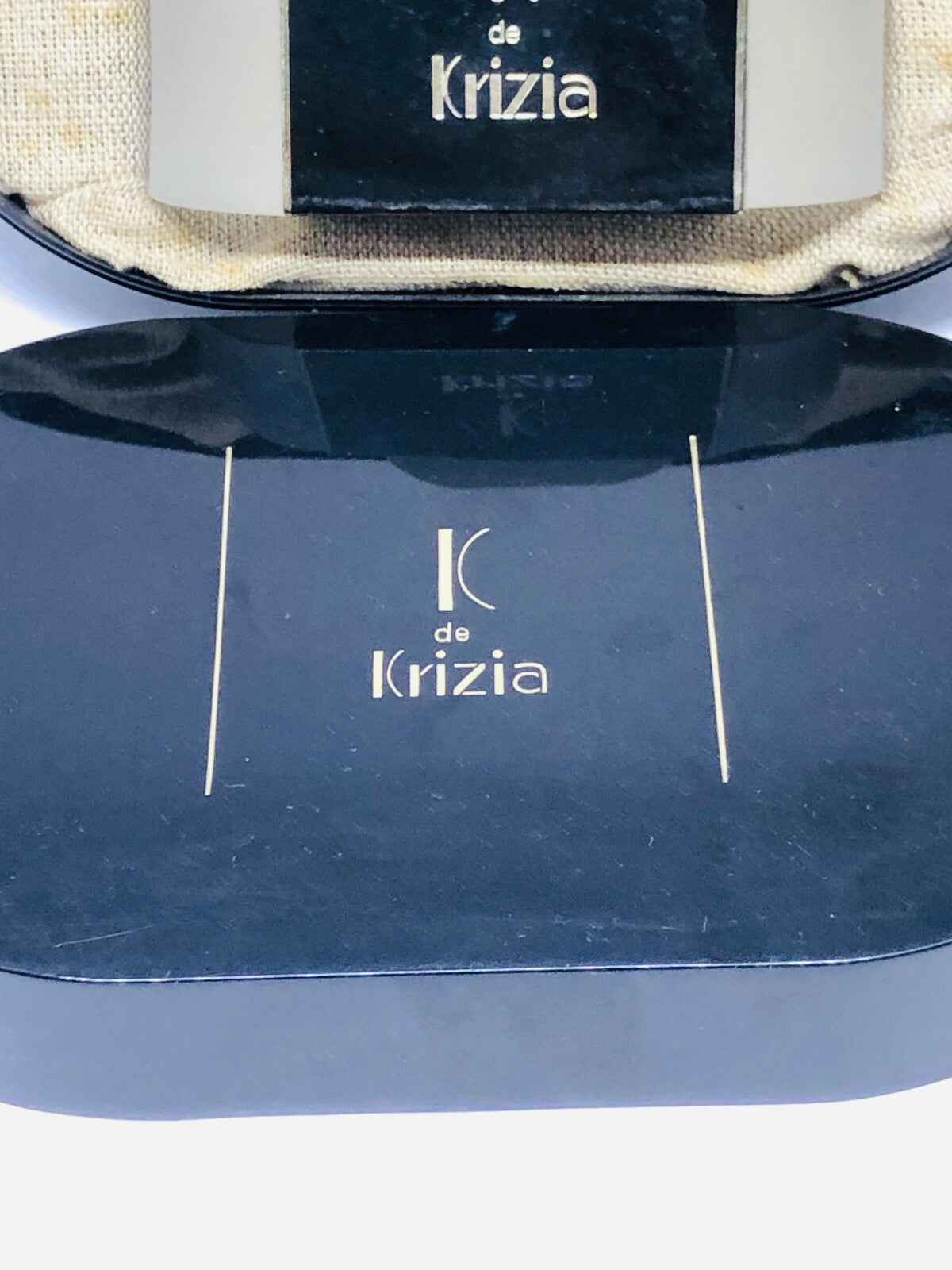 K Krizia Parfum Extrait Vintage confezione elegante con logo in oro su sfondo blu
