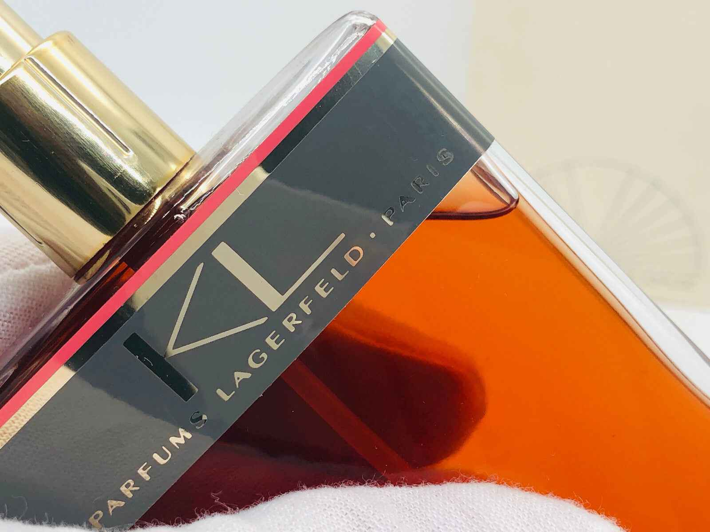 Profumo Karl Lagerfeld Donna Vintage con flacone elegante in vetro e tonalità arancione intenso