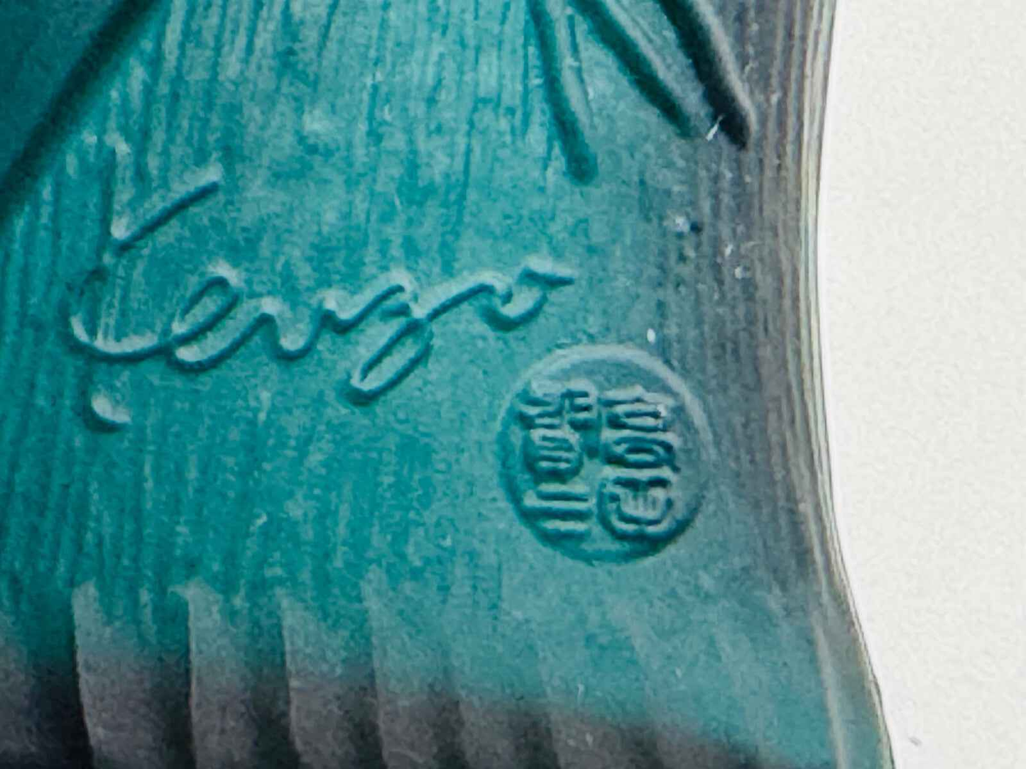 Bottiglia di profumo Kenzo Pour Homme Vintage con design elegante e colore verde intenso