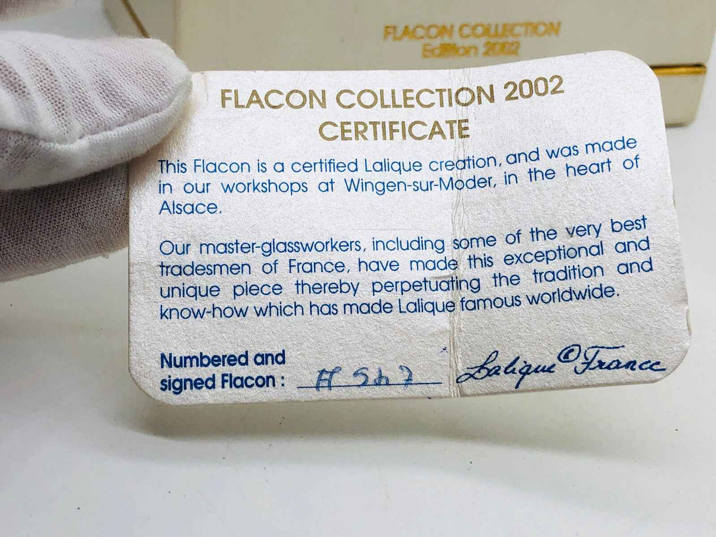 Certificato della collezione Flacon 2002 di Lalique Les Elfes con dettagli sulla tradizione artigianale