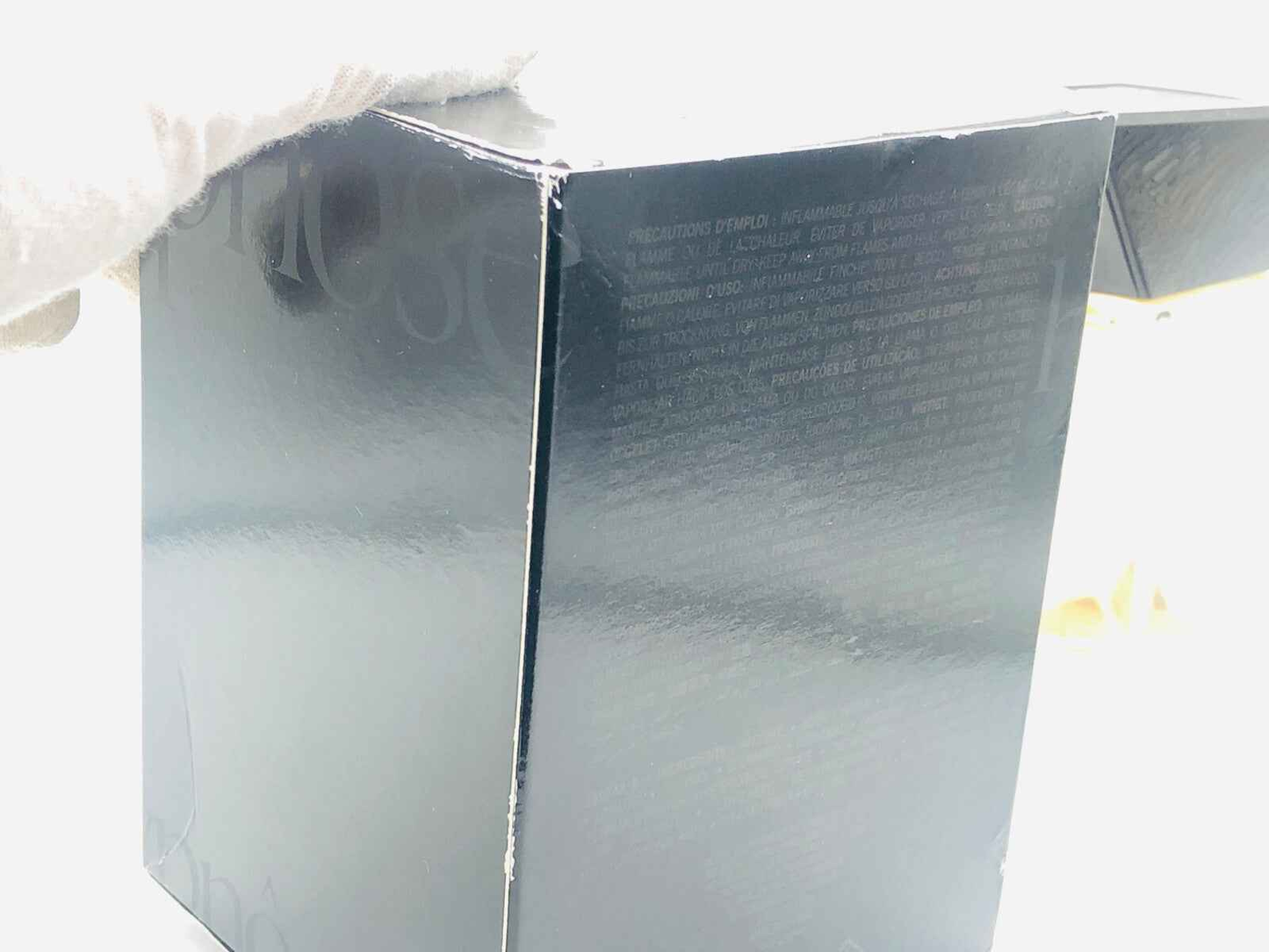 Scatola del profumo Hypnose Homme di Lancôme con finitura lucida e dettagli sul retro