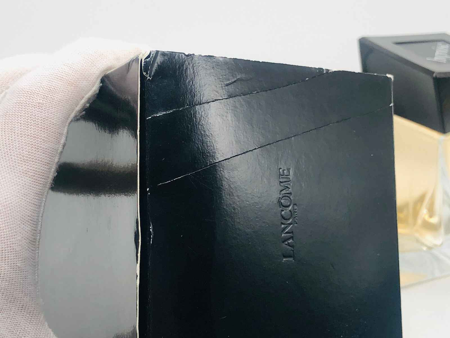Scatola di profumo Hypnose Homme di Lancôme con finitura lucida e design elegante