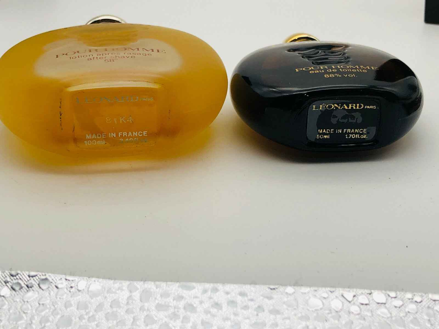 Flaconi di profumo Leonard Pour Homme in eleganti design nero e giallo, made in France
