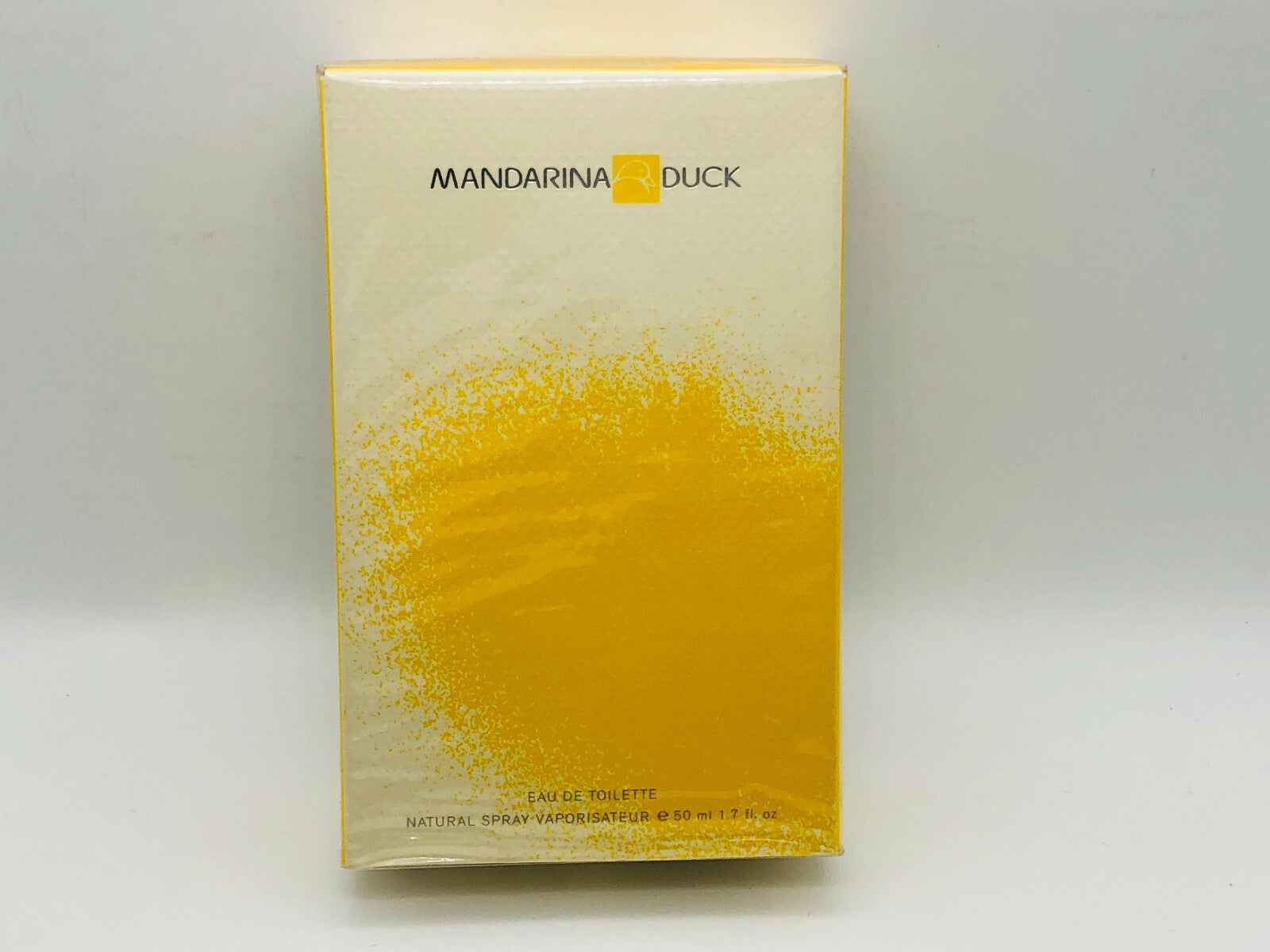 Scatola di profumo Mandarina Duck Eau de Toilette con packaging giallo elegante