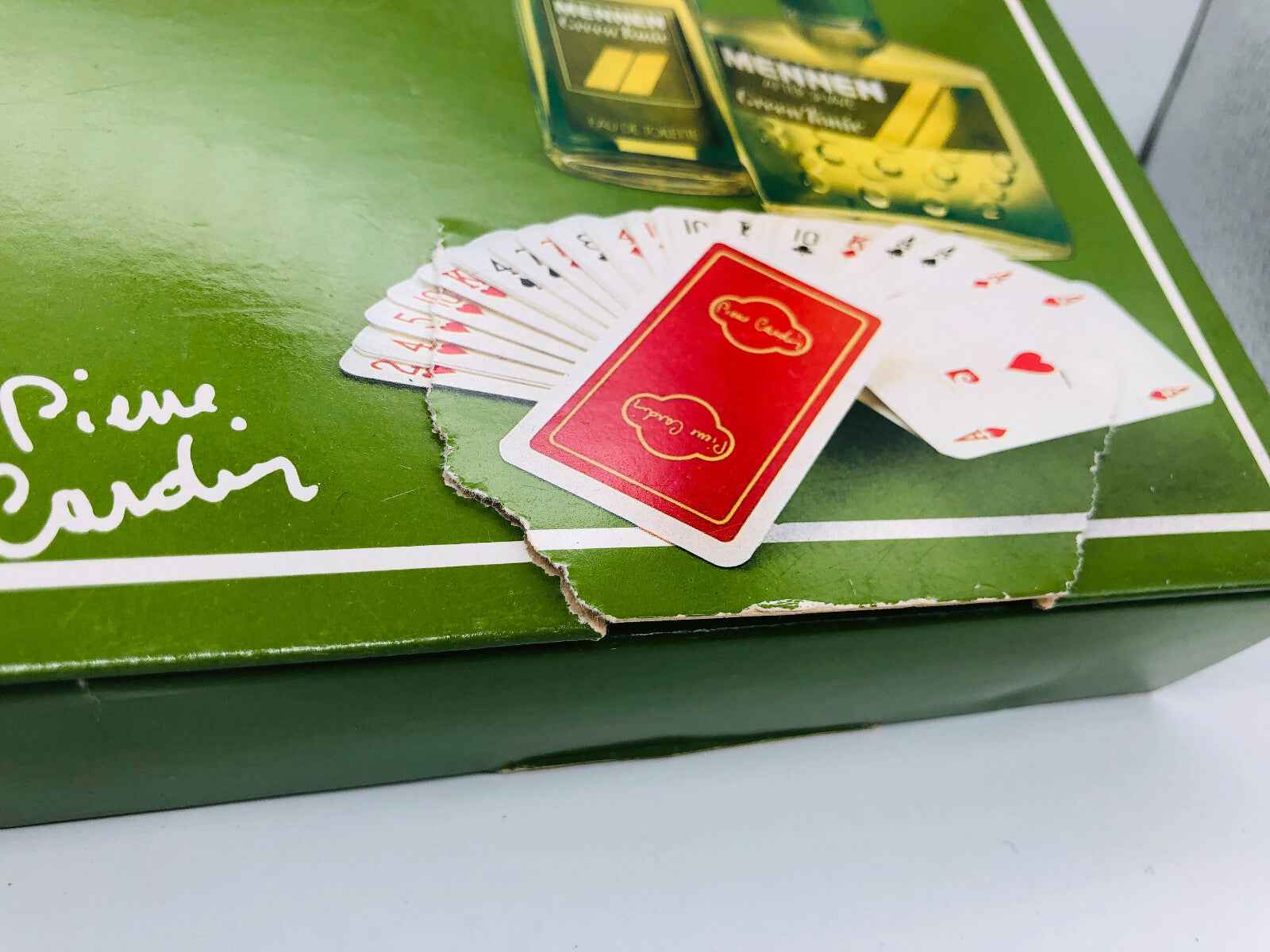 Scatola del profumo Green Tonic Mennen con carte da gioco incluse nel design elegante