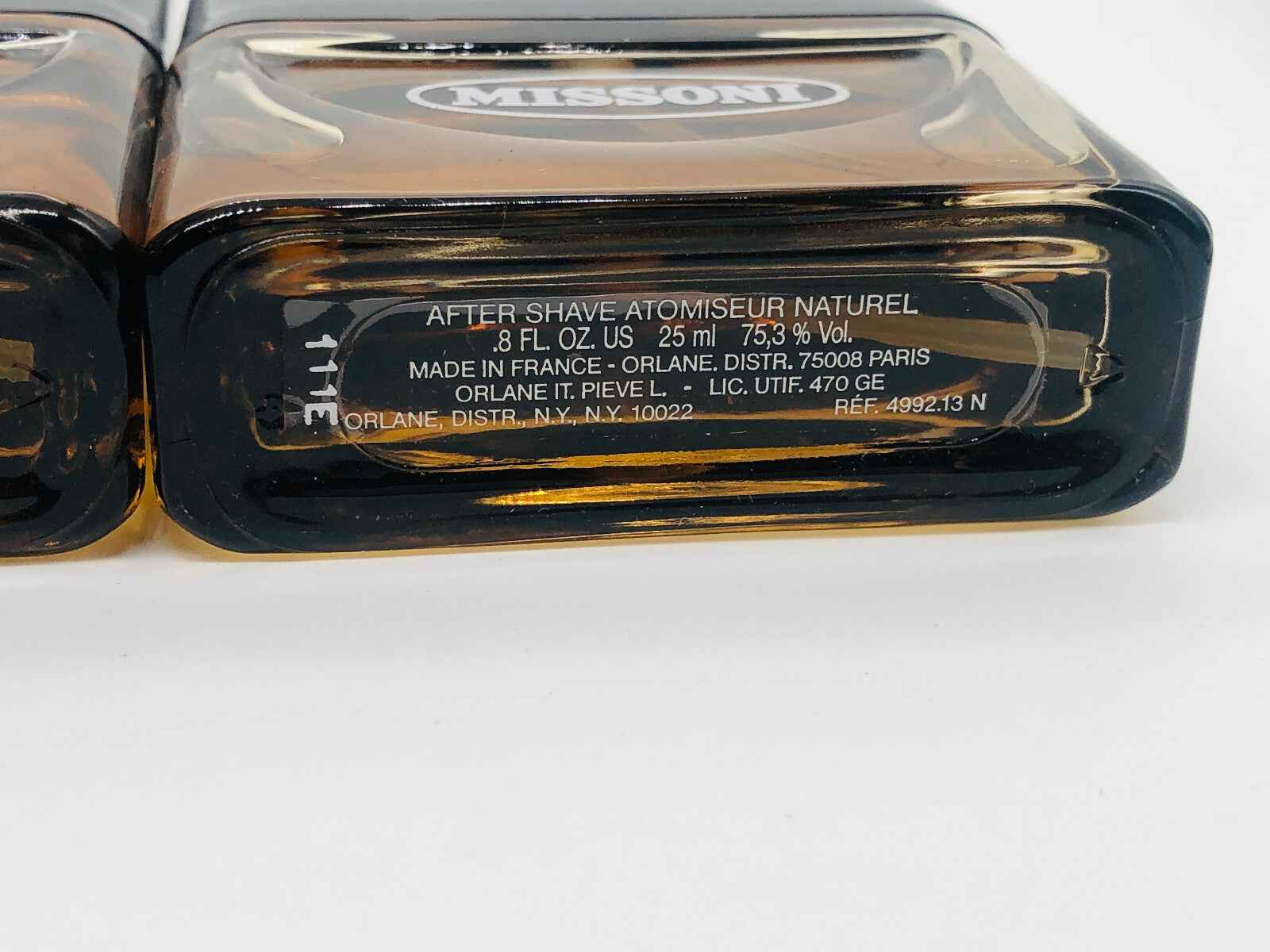 Flacone di profumo Missoni Uomo Vintage da 25 ml con design elegante per una sensazione di freschezza.