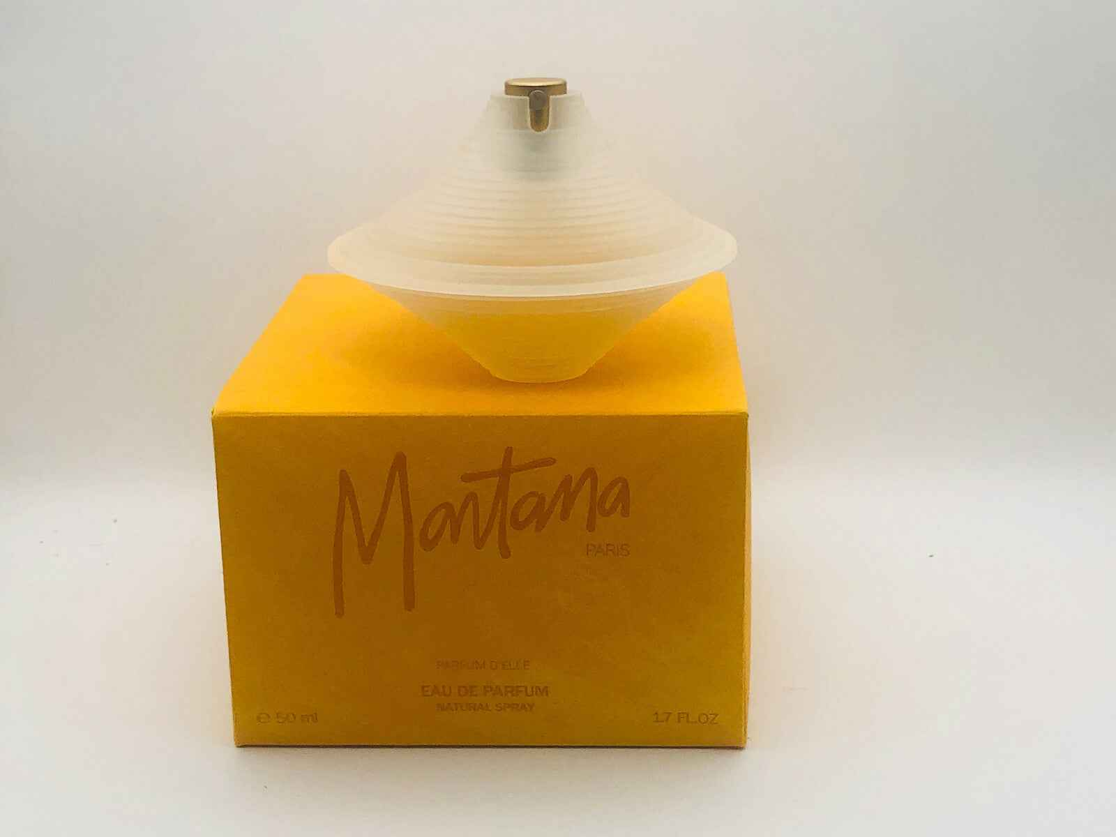 Profumo Vintage Montana in flacone elegante con confezione gialla per un tocco di classe