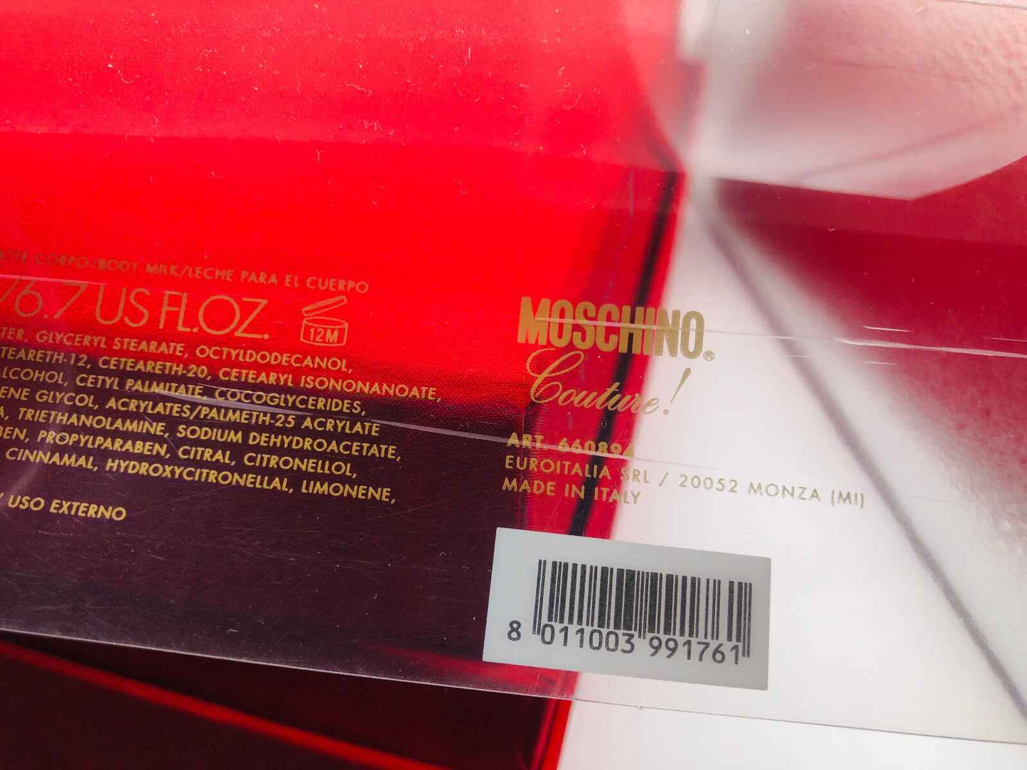 Scatola del profumo Moschino Couture Vintage con design elegante e dettagli in rosso