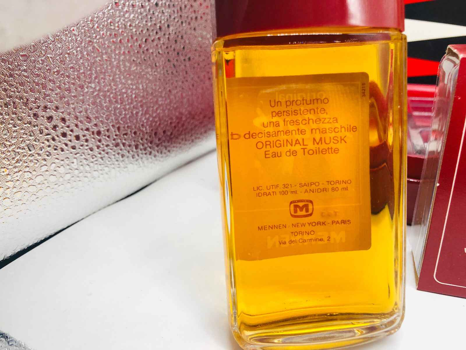 Fragranza Musk Mennen Profumo Vintage in flacone giallo con tappo rosso per uomini eleganti