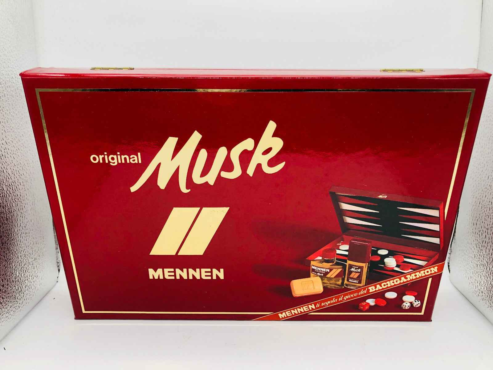 Scatola di profumo vintage Musk Mennen con dettagli eleganti e prodotti per uomo