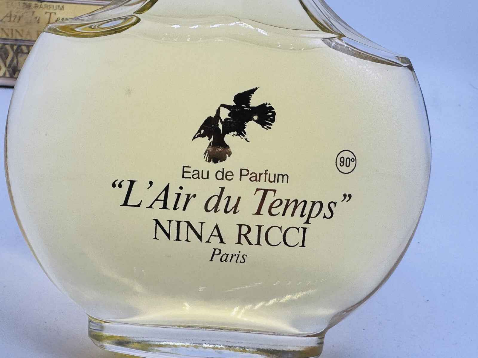 Profumo Nina Ricci L'Air Du Temps Vintage in bottiglia elegante con etichetta distintiva
