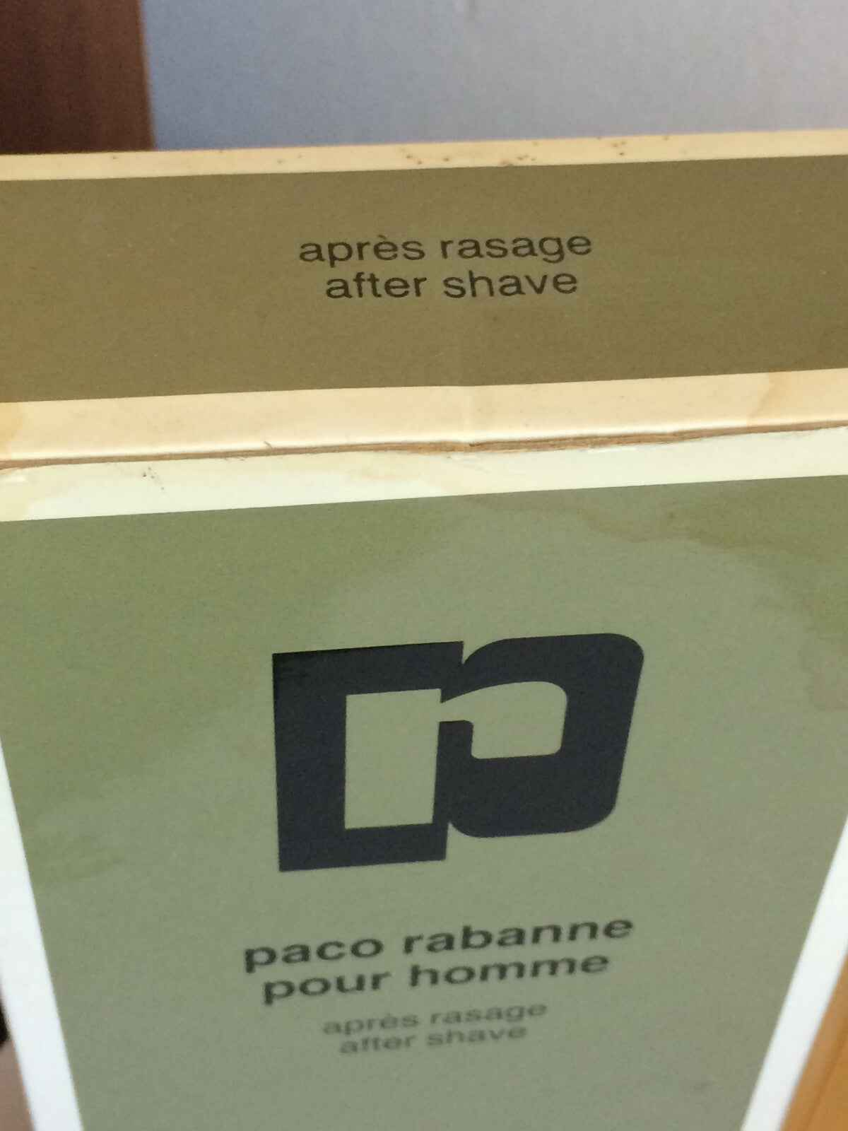 Scatola della crema dopobarba Paco Rabanne Pour Homme con scritte in francese e inglese