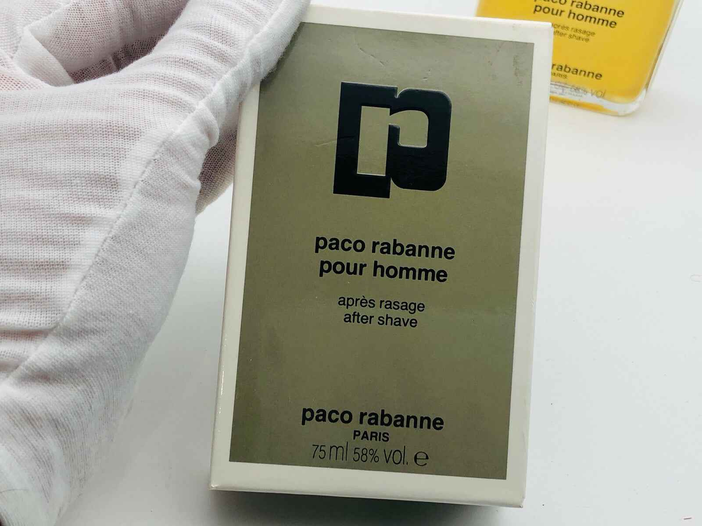 Scatola di Paco Rabanne Pour Homme Vintage con logo e dettagli del prodotto