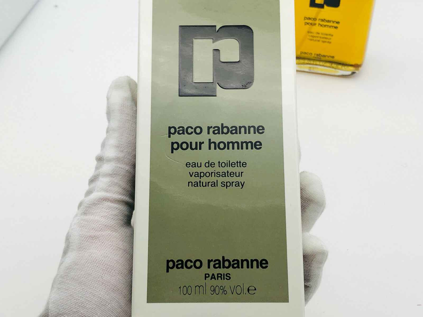 Flacone di Paco Rabanne Pour Homme Vintage Eau de Toilette da 100 ml, confezione elegante con logo.
