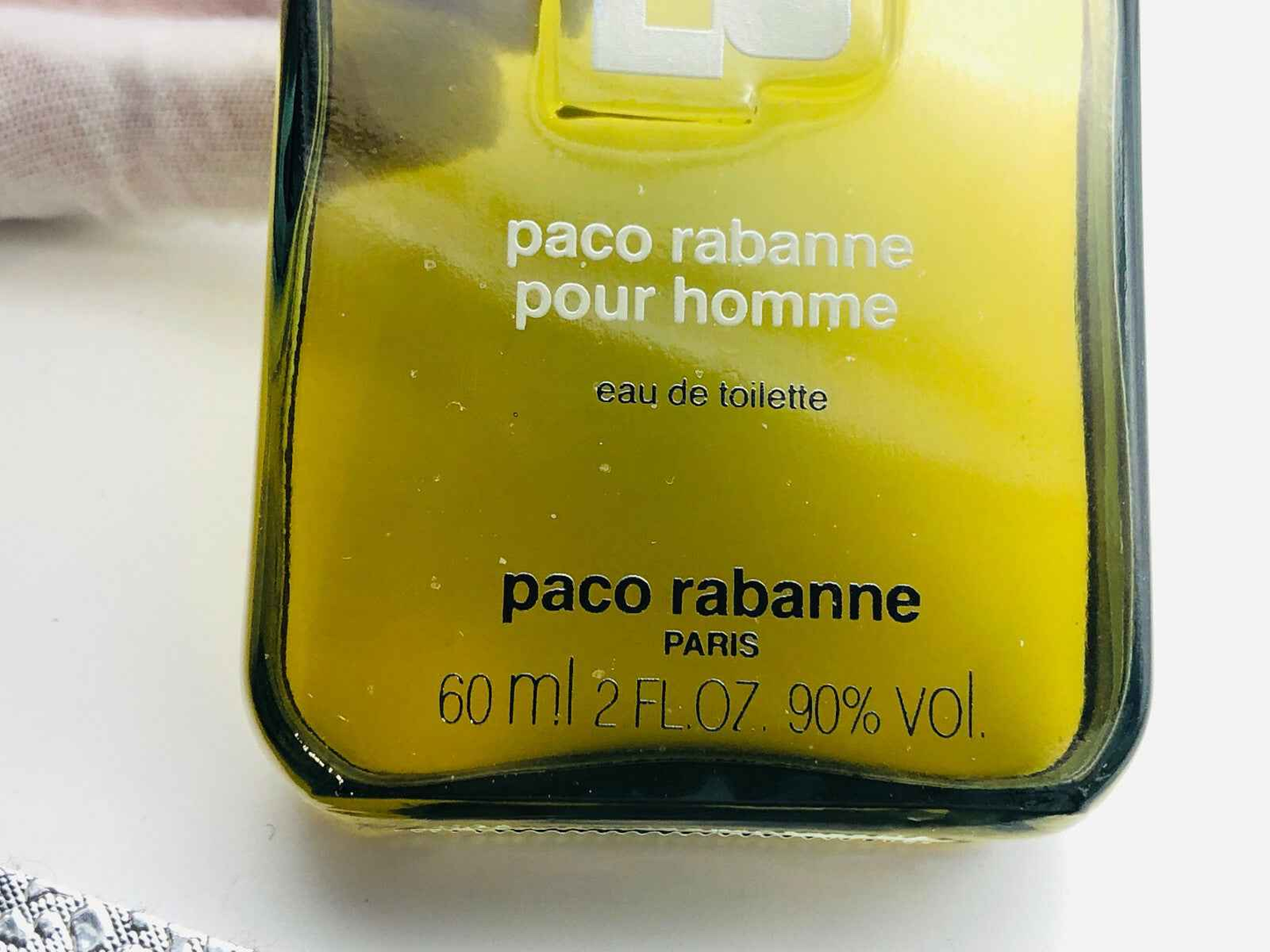 Flacone di profumo Paco Rabanne Vintage da 60 ml con etichetta in evidenza