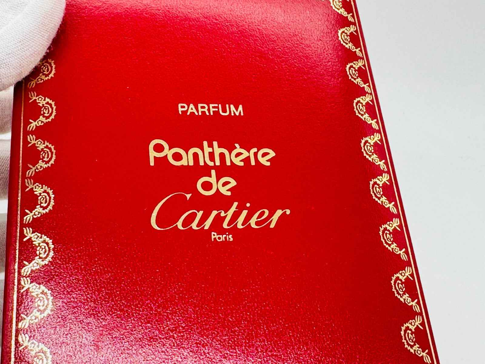 Scatola rossa del profumo Panthère Cartier Vintage con logo dorato