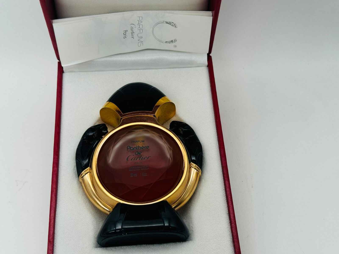 Bottiglia di profumo Panthere Cartier Vintage in forma di pantera con confezione rossa elegante