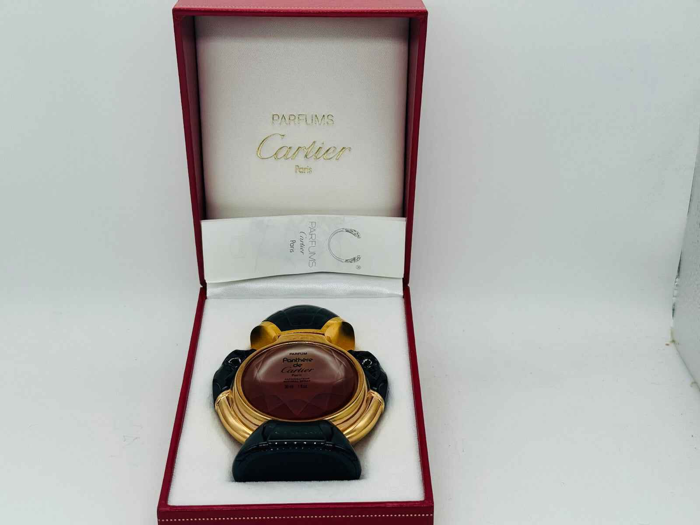 Flacone di profumo Panthere Cartier Vintage con design elegante in una confezione di lusso