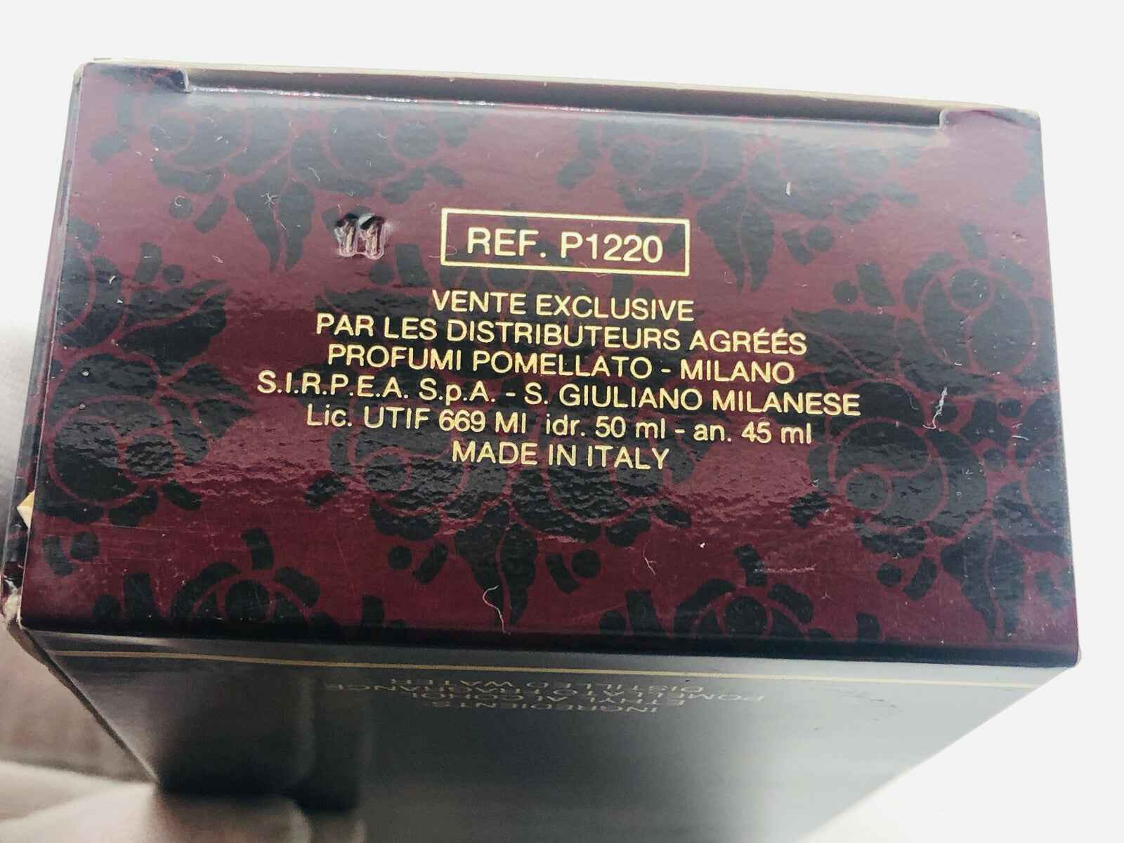 Scatola di profumo Pomellato Donna Vintage da 50 ml con design elegante in rosso e oro