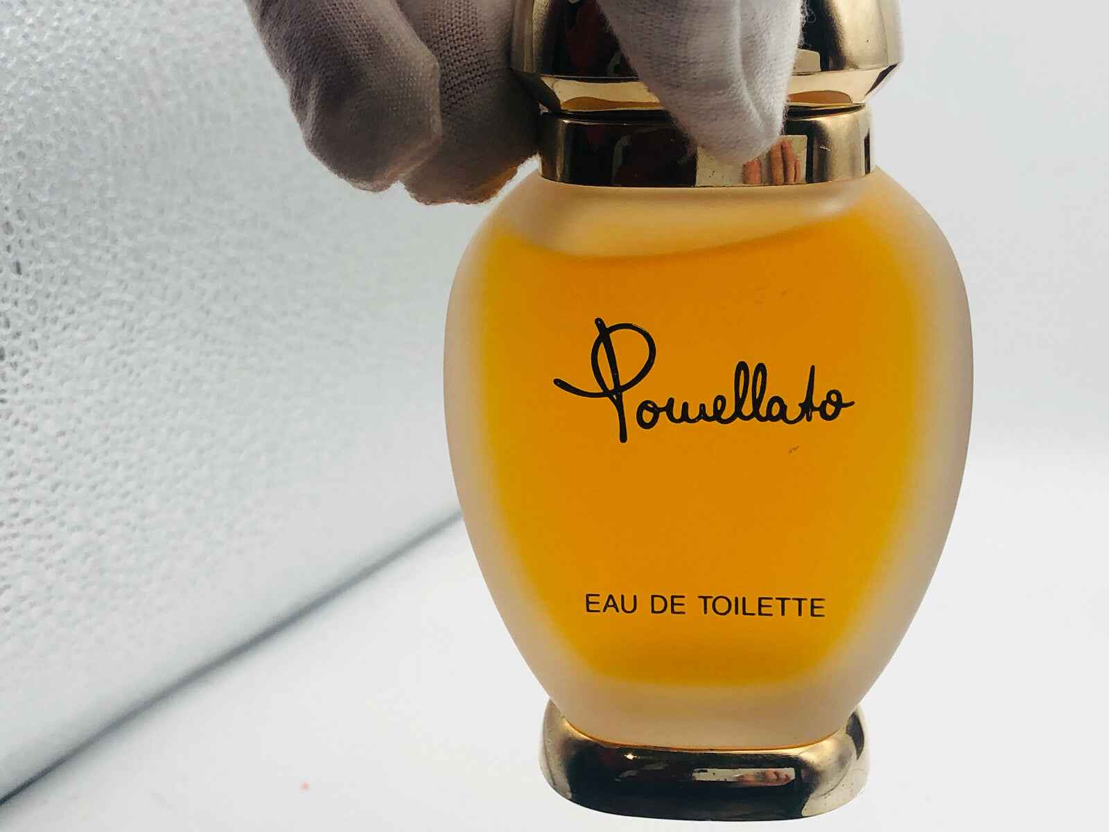 Flacone di profumo Pomellato Donna Vintage in vetro, elegante e raffinato, con tappo dorato