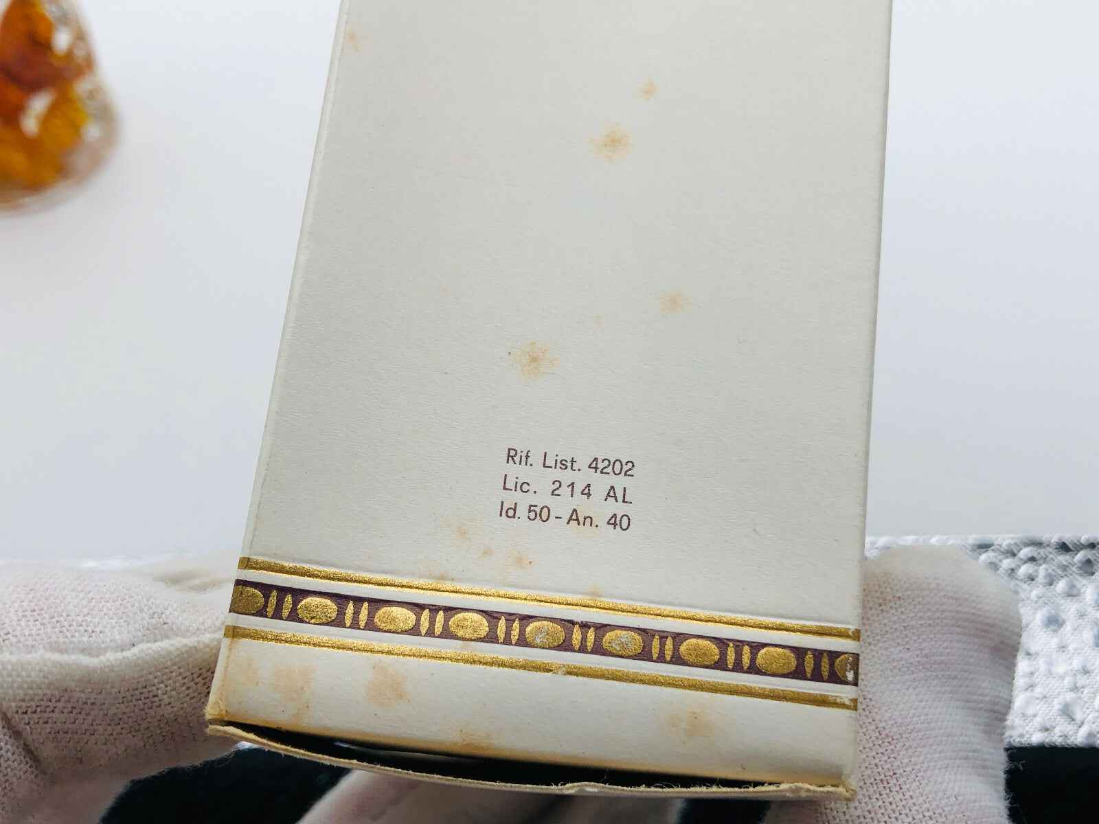 Confezione del Profumo Applauso Gandini con dettagli dorati e design elegante