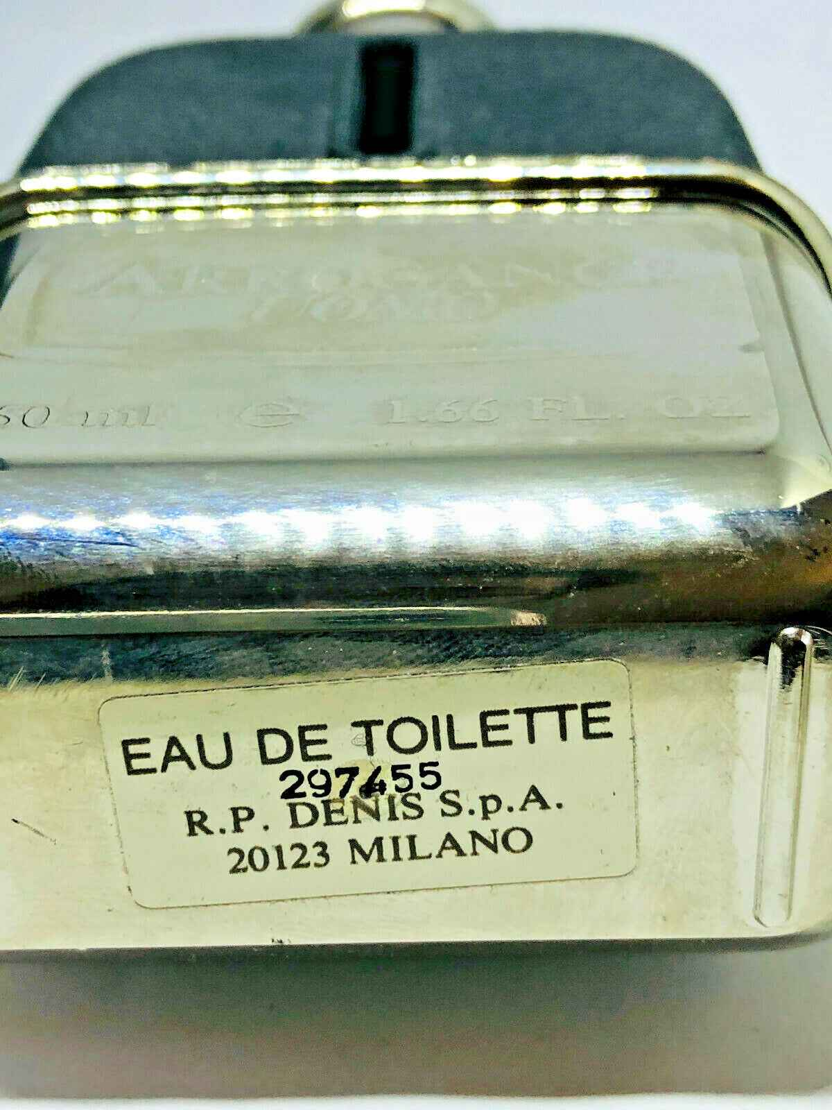 Flacone di profumo Arrogance Uomo Vintage con etichetta Eau de Toilette e design elegante