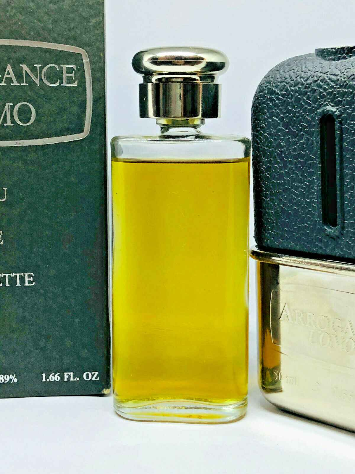 Flacone di profumo Arrogance Uomo Vintage in vetro con tappo metallico e confezione originale