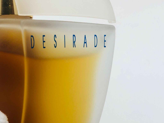 Flacone di profumo Aubusson Desirade Vintage con tonalità calde e design elegante