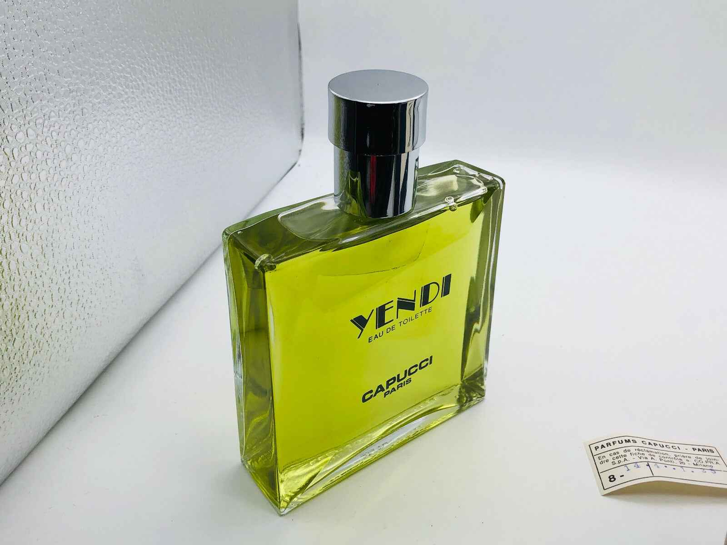 Flacone di profumo Capucci Yendi in vetro verde con tappo argentato per uomo