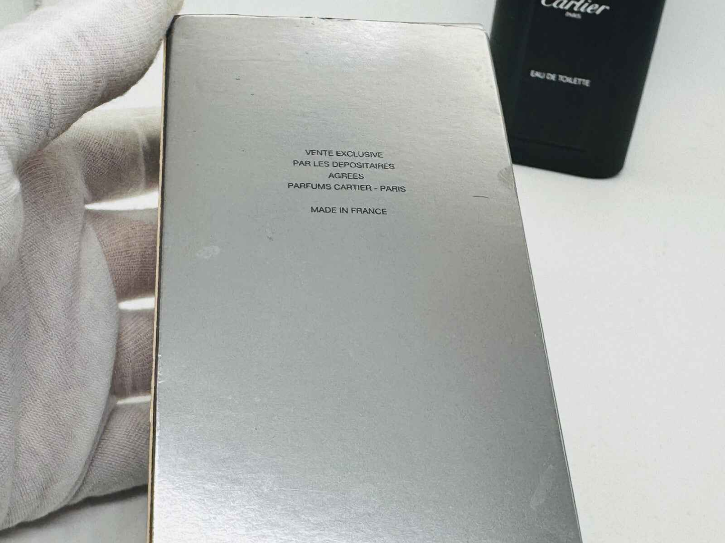 Scatola del profumo Cartier Santos Vintage con dettagli e testo in francese sul retro