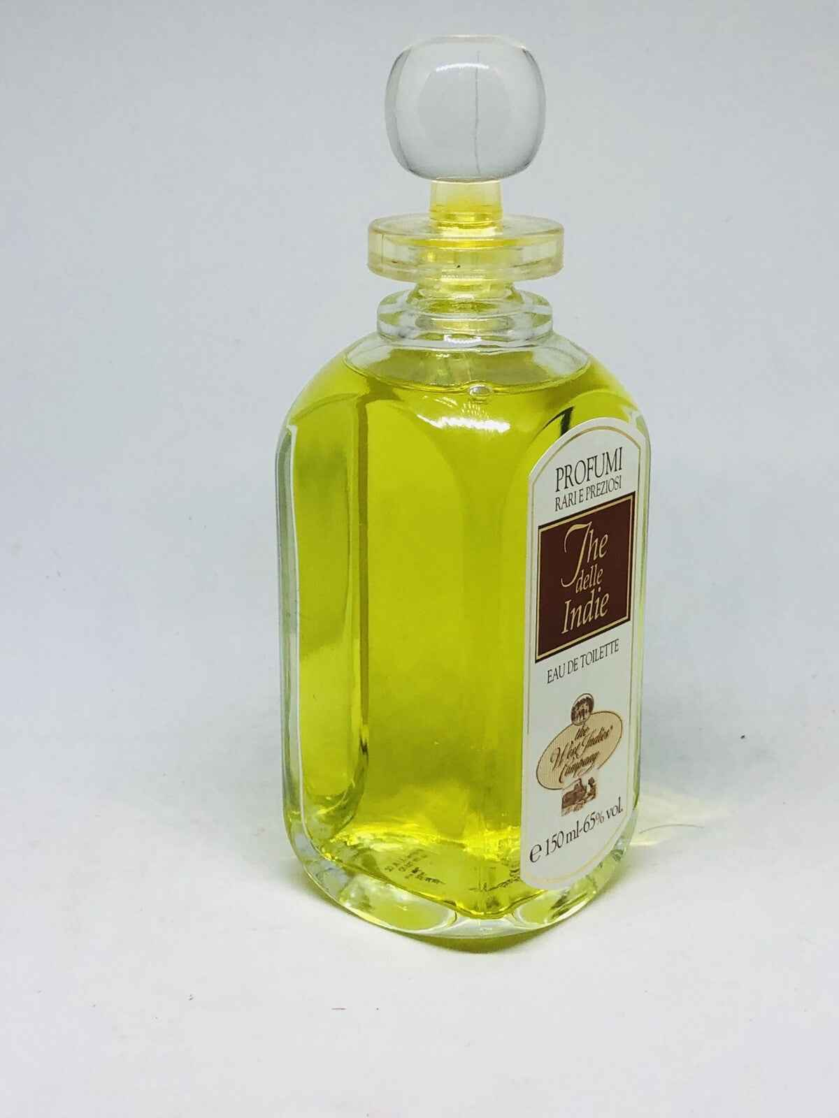Flacone di profumo Compagnia Delle Indie Eau de Toilette con liquido giallo brillante e tappo in vetro
