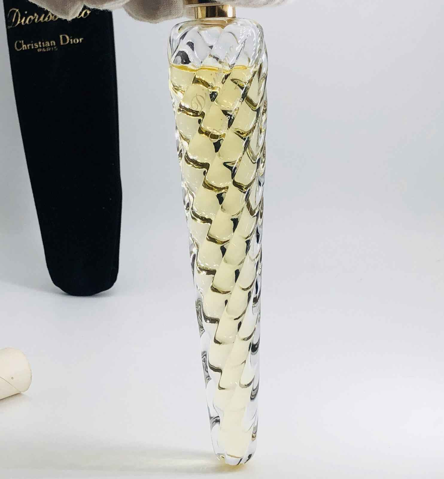 Flacone di profumo Dior Diorissimo Vintage con design elegante e fragranza raffinata